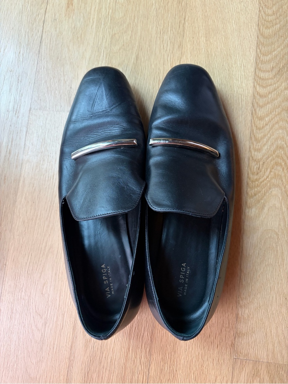 Via Spiga Black Leather Slip-On Loafers with Gold Bar Accent